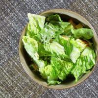 Caesar Salad · Romaine lettuce with crispy croutons and grated Romano cheese. Dressing on the side.
