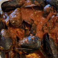 E.I. Mussels · Prince Edward Island mussels served in our house marinara or scampi sauce.