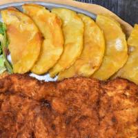 Pechuga Panada · Breaded chicken breast served with your two favorite sides
