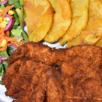 Lomo Apanado · Breaded pork loin served with your two favorite sides