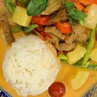 Vegan Duck Curry · Spicy red curry paste, pineapple, tomatoes, bell peppers, basil, and vegan duck. Served with...