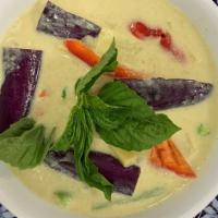 Vegan Green Curry · Spicy green curry paste, coconut milk, eggplant, bell peppers, bamboo shoots, carrots, strin...
