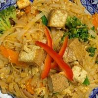 Vegan Pad Thai  · Rice noodles stir-fried with bean curd, bean sprouts, scallions and crushed peanuts. Served ...