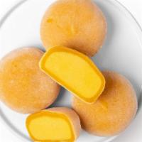 Vegan Mango Mochi (1Pc) · Creamy coconut base flavored with honey mango puree, creating a bold fruity flavor that is r...