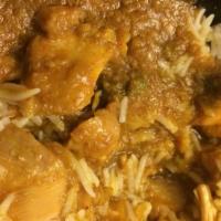 Chicken Curry · Boneless chicken cooked in traditional curry sauce.