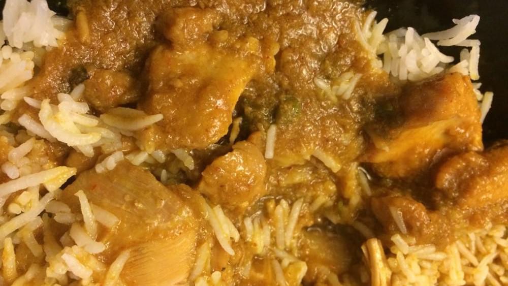 Chicken Curry · Boneless chicken cooked in traditional curry sauce.