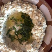 Baba Ghanough · Grilled eggplant dip with sesame sauce and lemon juice.