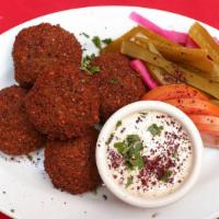 Falafel · Fried ground chickpeas with onions and herbs.