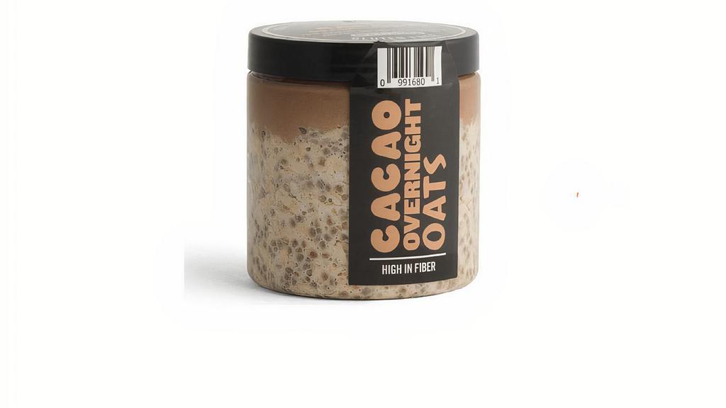 Cacao Overnight Oats · Rolled oats (GF) and chia seeds topped with chocolate cashew chia pudding. JP Favorite! Ingredients: cacao, gluten free rolled oats, chia seeds, cashews, pea protein, date, vanilla, almond milk, chocolate, coconut oil, acerola, sea salt. CONTAINS CASHEWS AND ALMONDS