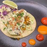 Chicken Tikka Tacos(3) · Grilled Chicken marinated in Tikka sauce, Onions, Roasted Red Peppers, Arugula , Crispy Corn...