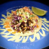 Pulled Pork Tacos (3) (Gf) · Shredded Pork, Slaw, Pickled Onions, Sesame seeds, Scallions, Fried Onions and Scallions