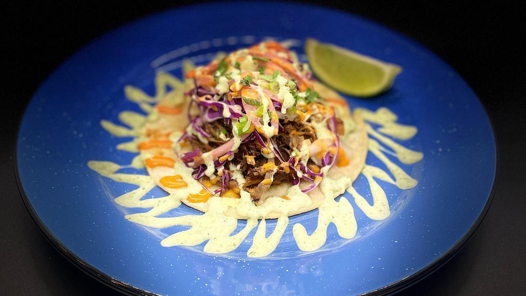 Pulled Pork Tacos (3) (Gf) · Shredded Pork, Slaw, Pickled Onions, Sesame seeds, Scallions, Fried Onions and Scallions