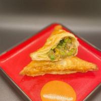 Classic Samosa Puff · Spiced Potato and peas. Served with Herb Aioli