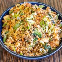 Classic Fried Rice · Soy Sauce blended Rice with Veggies, Herbs and your choice of Protein.