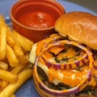 The Sterling Burger · 1855 Angus Beef Patty , Pepper Jack Cheese, Siracha Aioli, Roasted Peppers, Onions and Arugu...