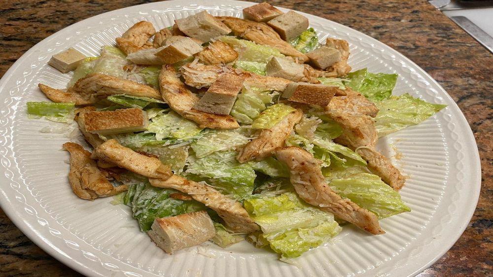 Caesar Salad · Add chicken or shrimp for extra charges.