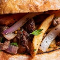 Beef Stir Sandwich · Beef, Tomato, Onions, Fries, Soy Sauce on a Ciabatta Roll.