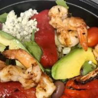 Toscana Salad · Grilled shrimp, jumbo lump crab meat, avocado & roasted red peppers topped with crumbled blu...