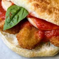 Vertage Chicken Parm · ALL PLANT BASED: fried chicken, fresh mozzarella, tomato sauce, parmigiano