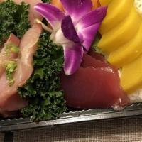 Chirashi · With soup and salad, sashimi comes with a bowl of white rice.