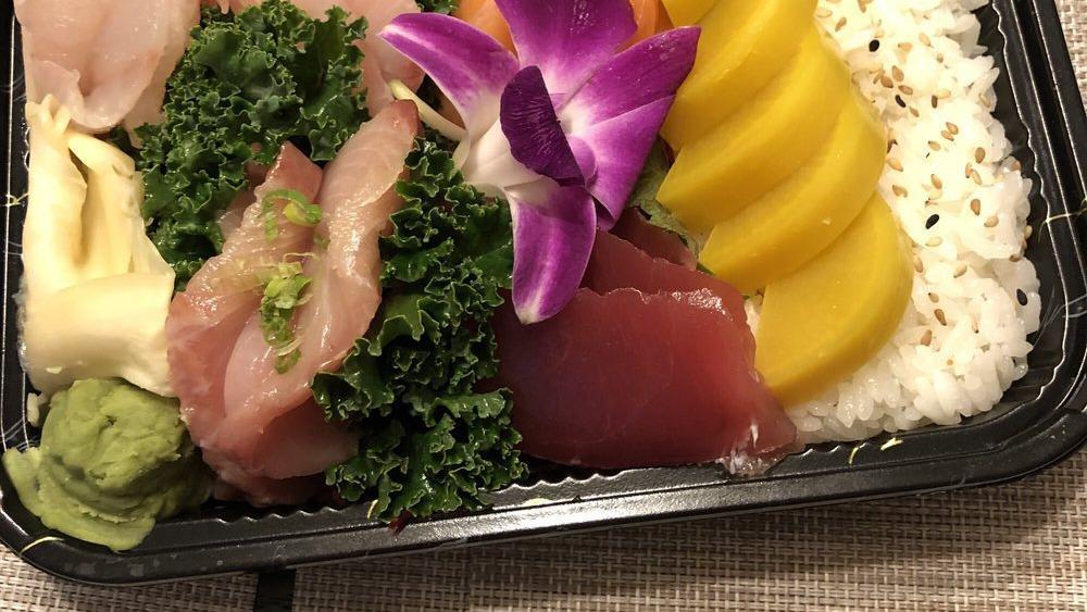 Chirashi · With soup and salad, sashimi comes with a bowl of white rice.