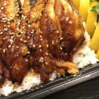 Unagi Don · Broiled eel over rice served in a box.