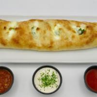Stromboli (Small) · Fresh pizza roll stuffed with Mozzarella and your choice of toppings.