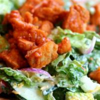 Buffalo Chicken Salad · Romaine, buffalo chicken, pepper jack cheese, celery, tortilla, strips, and blue cheese dres...