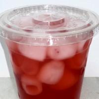 Strawberry Hibiscus Lemonade Refresher · Iced hibiscus and strawberry herbal tea made with lemonade.