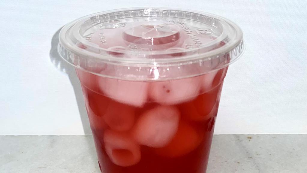 Strawberry Hibiscus Lemonade Refresher · Iced hibiscus and strawberry herbal tea made with lemonade.