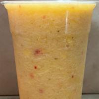 Tropical Sunrise Smoothie · A blend of mango, pineapple, banana and strawberries.
Vegan and gluten free
