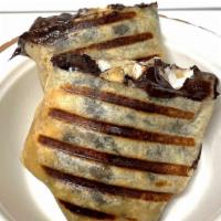 Chocolate Banana Marshmallow Wrap  · Banana, dairy free chocolate, and marshmallows toasted in a gluten free wrap. 
Gluten free a...