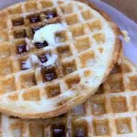 Whole Grain Waffles · Gluten free, Dairy free, Vegan. 
Served with vegan butter and a drizzle of maple syrup.