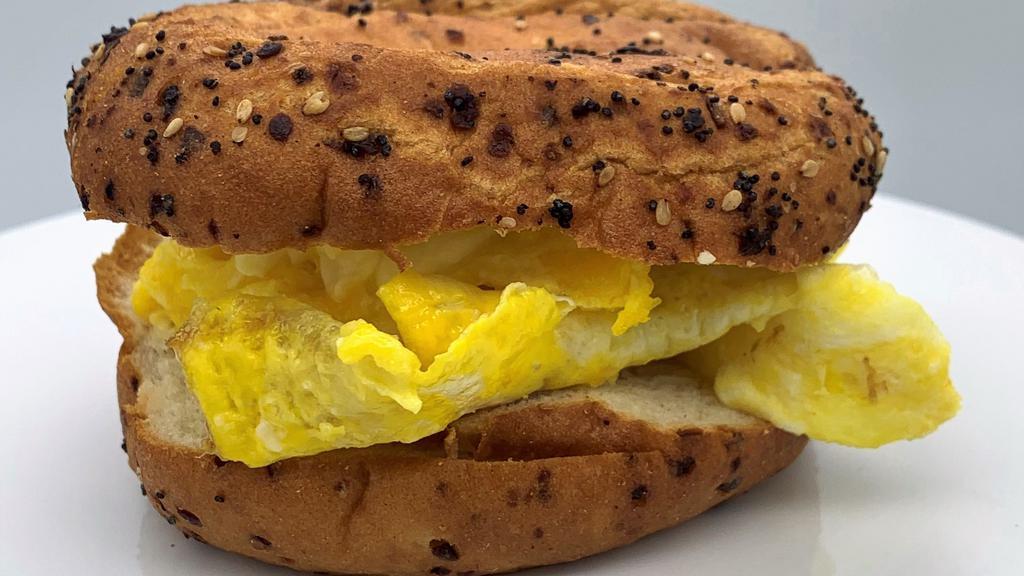 Scrambled Cage Free Eggs On Gf Everything Bagel · Gluten-free, Dairy-free