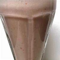 Strawberry Banana Breakfast Smoothie · A blend of coconut yogurt, strawberries, bananas, and oat milk.