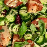 Hummus Salad · Small plant-based salad.
Made with organic produce. 
Vegan + GF + DF