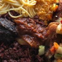 Waakye · Rice and black eye beans cooked together with Goat meat,spaghetti ,boiled egg,tomato stew,sh...