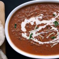 Dal Makhani · Black lentil cooked over nite in very slow fire flavored with butter. Served with basmati ri...