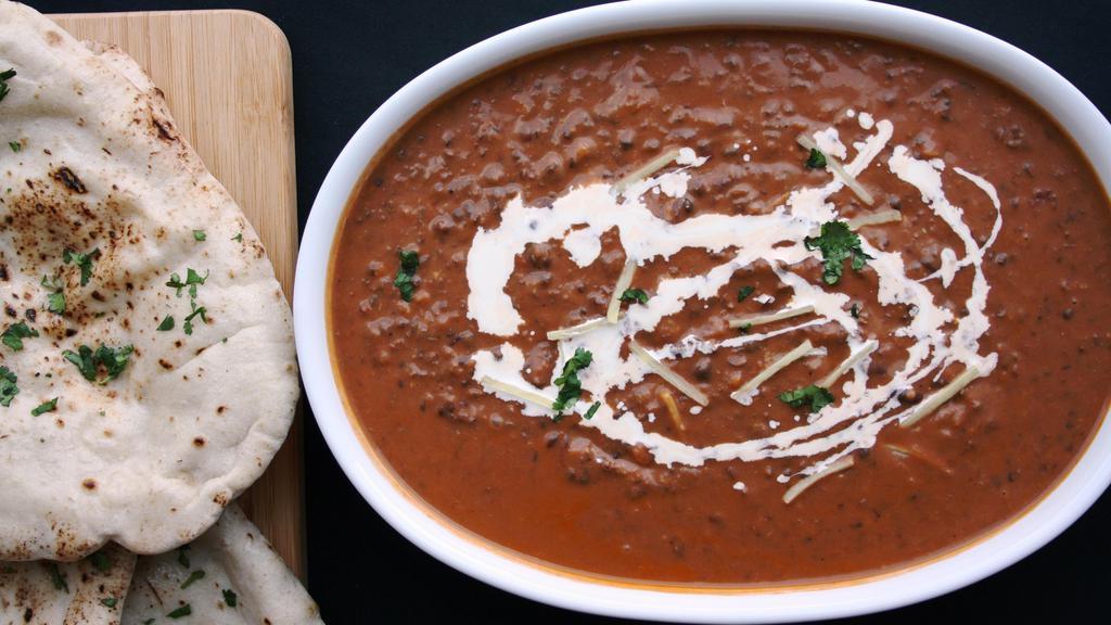 Dal Makhani · Black lentil cooked over nite in very slow fire flavored with butter. Served with basmati rice on side.