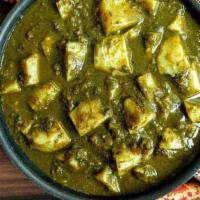 Saag Aloo · Flavorful blend of spinach and potato. Served with basmati rice on side.