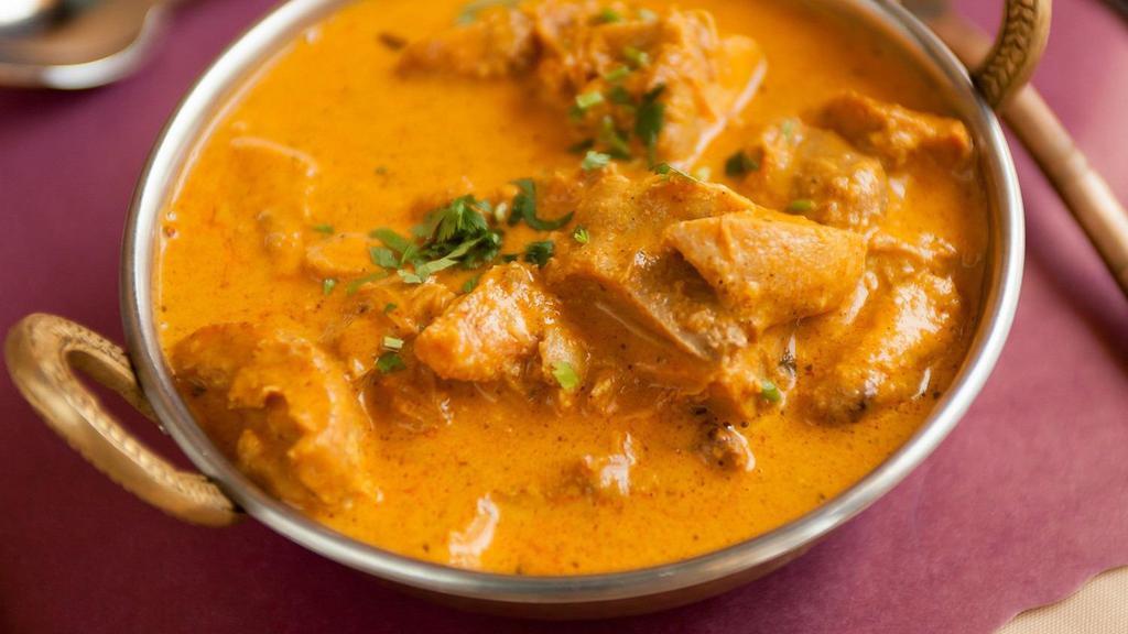 Shahi Chicken Korma · Boneless chicken cooked in our special saffron and cashew nut sauce. Served with basmati rice on side.