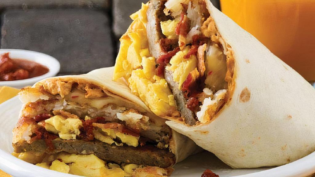 Big Breakfast Burrito Wrap · 3 Scramble eggs American cheese, Bacon, Sausage, Chipotle Salsa and Jalapeno Cream Cheese  with
 Hash Brown on it