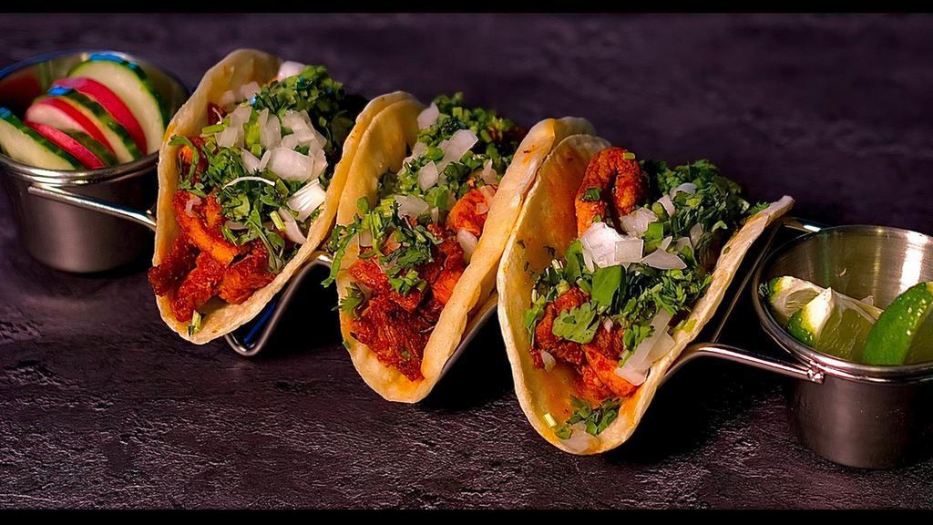 Taco · Corn Tortillas with Choice of Meat Onions, Cilantro and Our Homemade Green/Red Sauce