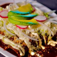 Enchilada · Tortilla Rolls Stuffed With Your Choice Of Chicken Or Cheese Smothered In Mole Poblano, Gree...