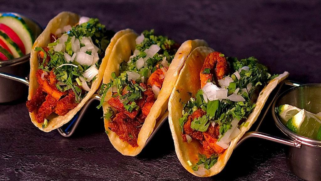 Mini Taco Trio (3)
 · Corn Tortillas with Choice of Meat, Onions, Cilantro and Our Homemade Green/Red Sauce