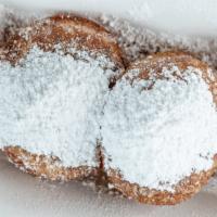 Honey Biscuits · Served with honey or syrup, powdered sugar, and cinnamon.