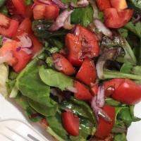 Salad · Mixed greens and tomato.
