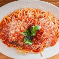 Chicken Parmigiana · With spaghetti and marinara sauce.