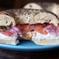 Ocean Bagel · Cream cheese, smoked salmon, onion, capers, and tomatoes.