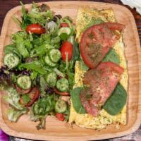 Veggie Omelette · Spinach and tomatoes. Add cheese for an additional charge.